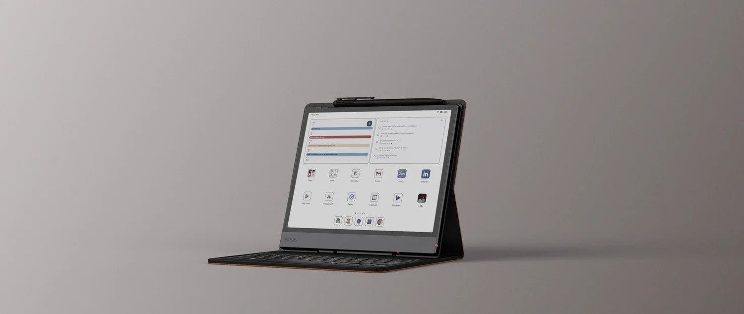 BOOX Note Air5 C standing on its keyboard cover with a document interface on screen.