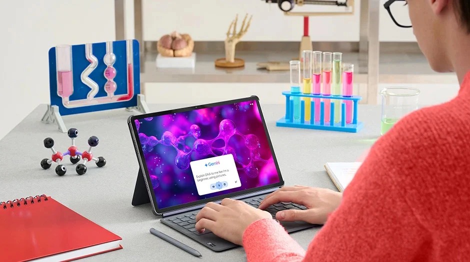 Person using Lenovo Idea Tab Pro with its keyboard in a manufacturer study scene.
