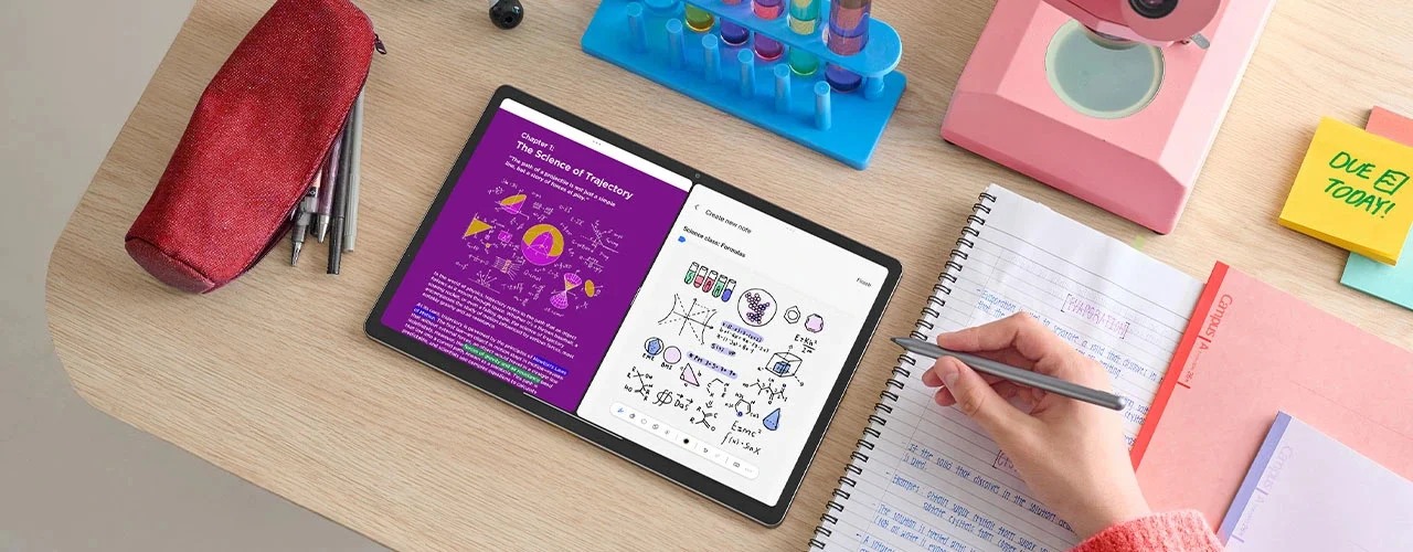 Lenovo Idea Tab Pro on a desk displaying a split-screen science document with a pen in use.